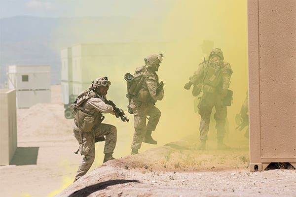 Live training events such as this USMC urban patrol exercise are becoming more focused on preventing "collateral damage" to civilians in combat zones.