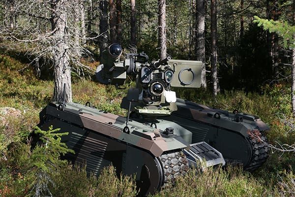The Titan/THeMIS UGV with a Kongsberg Defence and Aerospace PROTECTOR remote weapon station.
