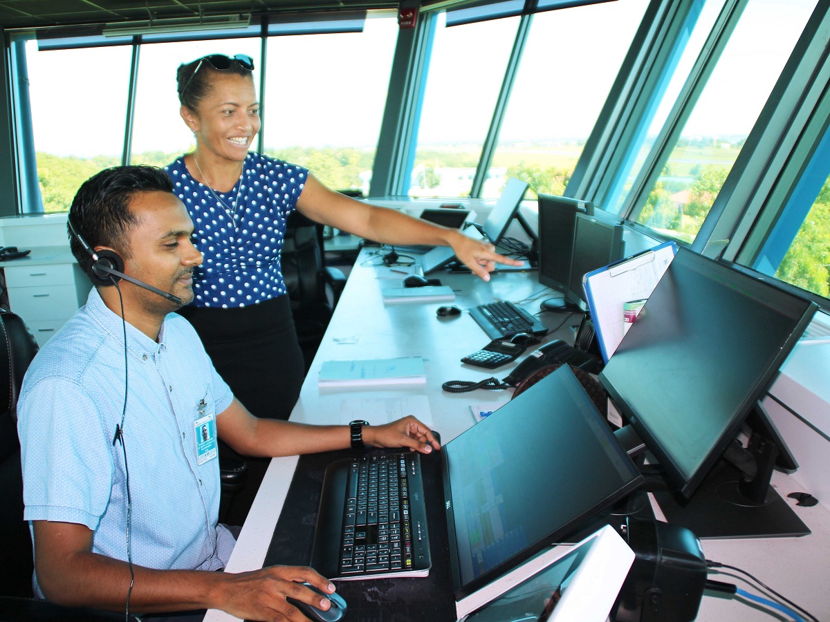 Air traffic controllers stanley prakash and jackie tabua using the new aurora atm system in the nadi tower z low res