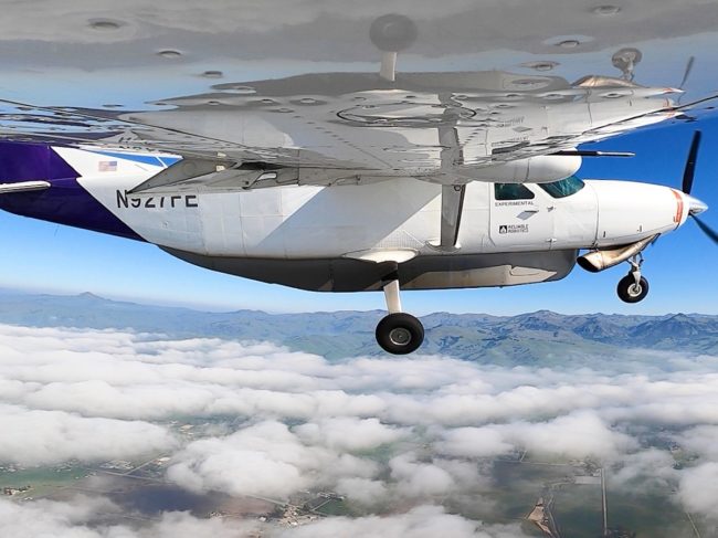 Photo 2 Reliable Robotics_Cessna 208 Caravan flying over fog[15433].jpg